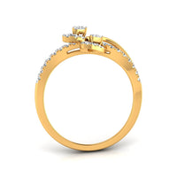 A yellow gold ring with a bow-like top set with small clear stones, shown on a plain white background.
