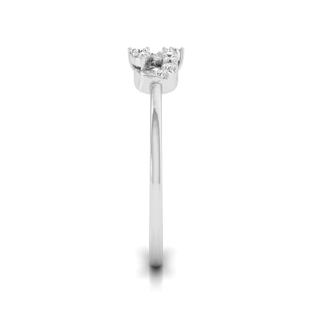 A silver-tone ring with a three-stone cluster setting on a plain white background. white gold