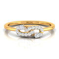 A yellow gold ring featuring a double-helix design paved with round and pear-cut diamonds, set against a clean white background with a soft reflection.