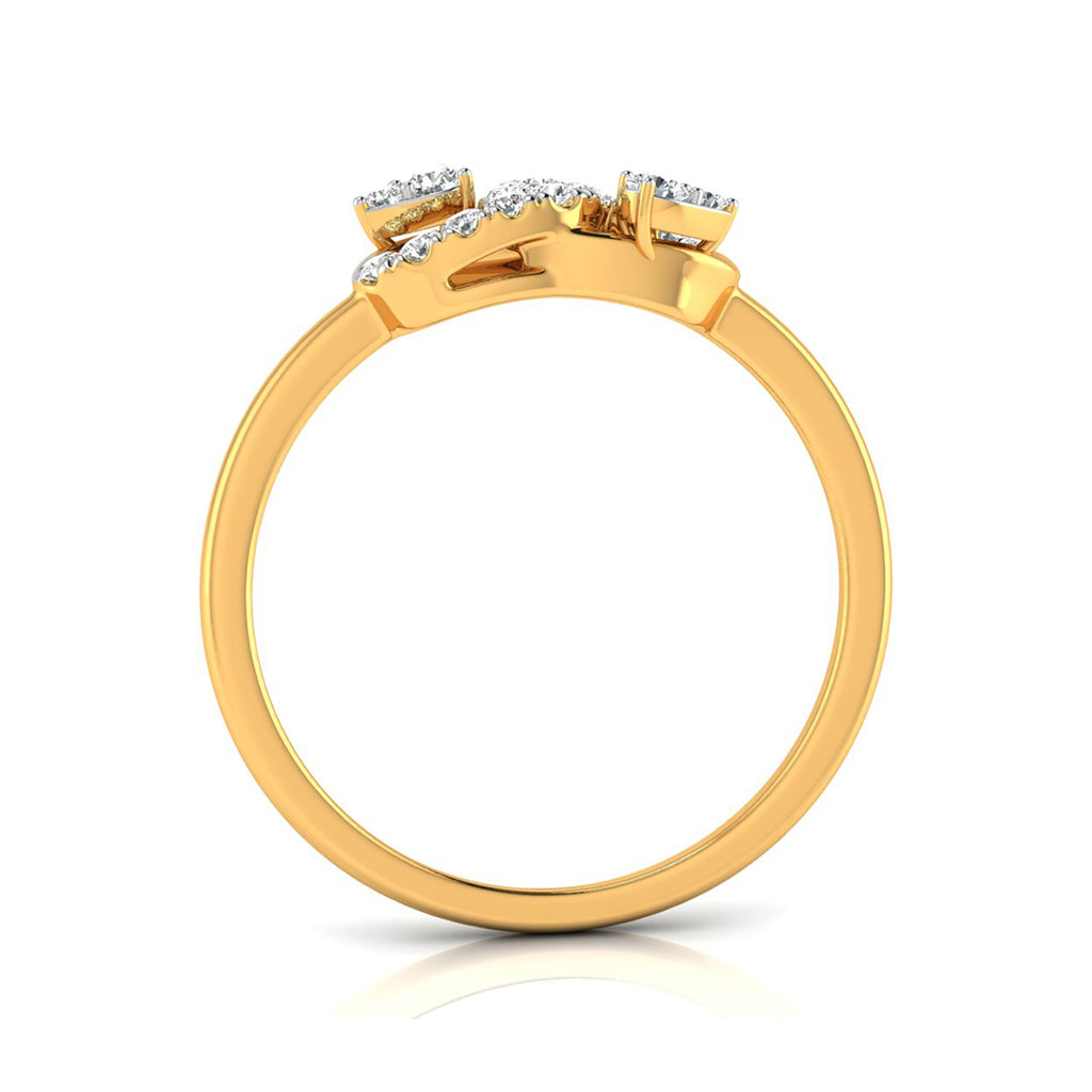 A yellow gold ring with a cluster of small clear gemstones at the top, shown from a side angle on a white background with a soft reflection.